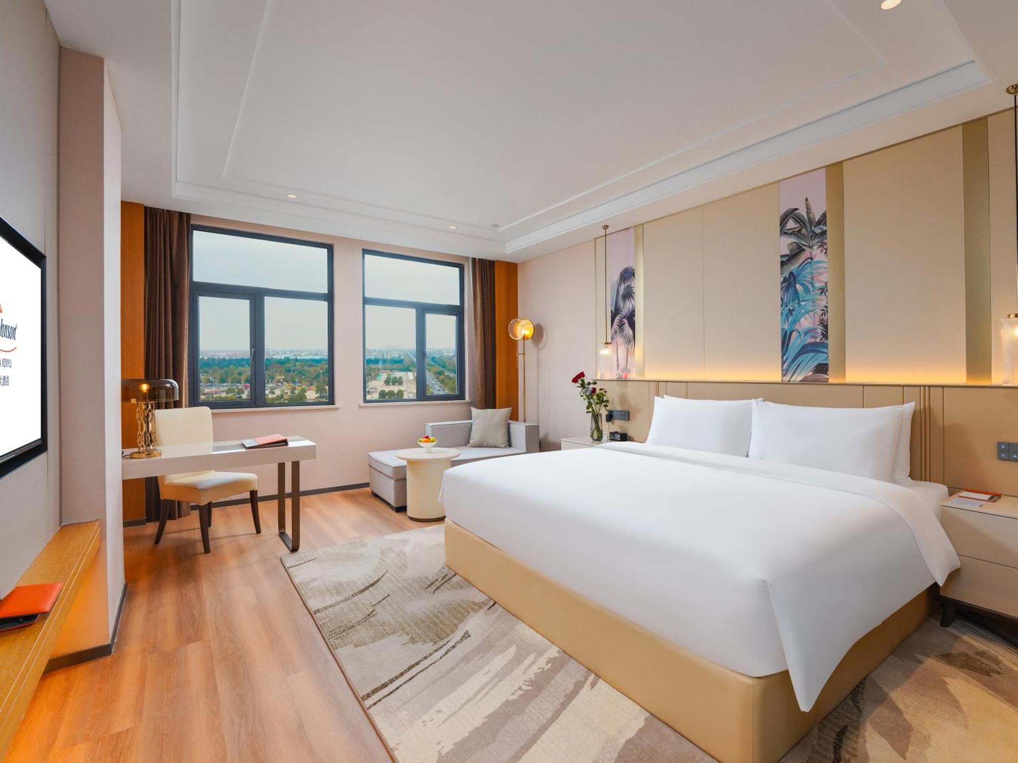 Howard Johnson By Wyndham Huaqiao Plaza Xinyu Hotel Bagian luar foto